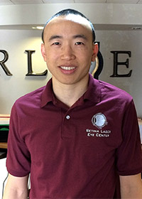 optometrists helping patients vision